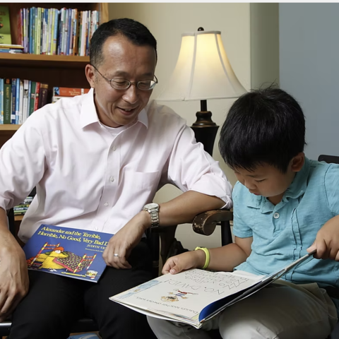 Professor Jimmy Kim with a student
