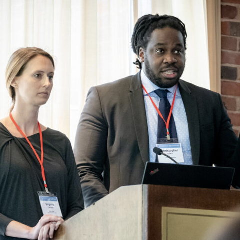 Two people presenting.