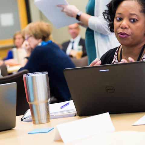 people talking in a meeting