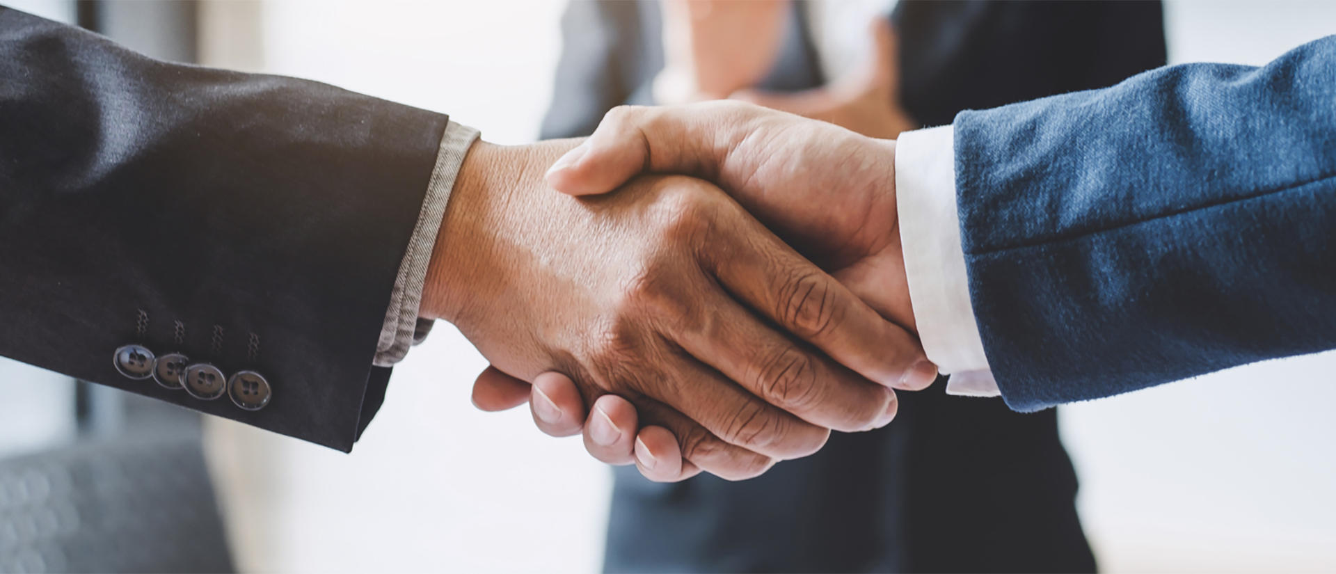 two men shaking hands