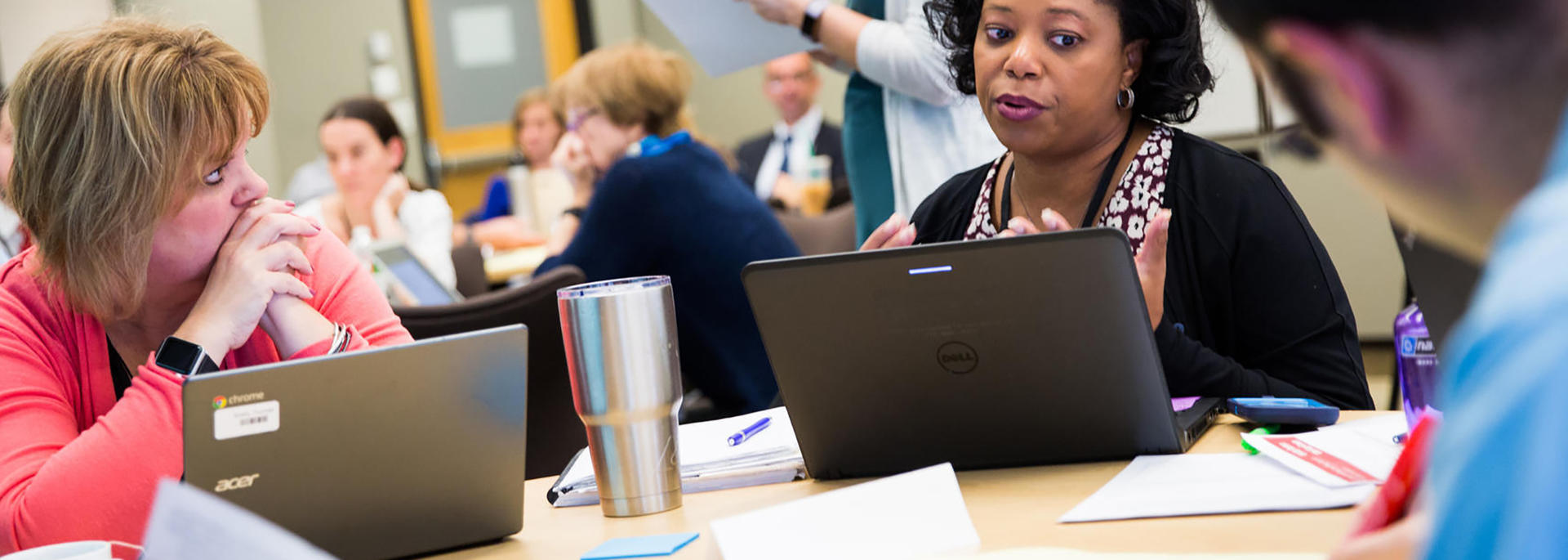 people talking in a meeting