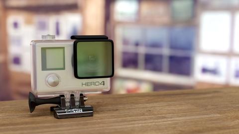 video camera propped on a wooden ledge